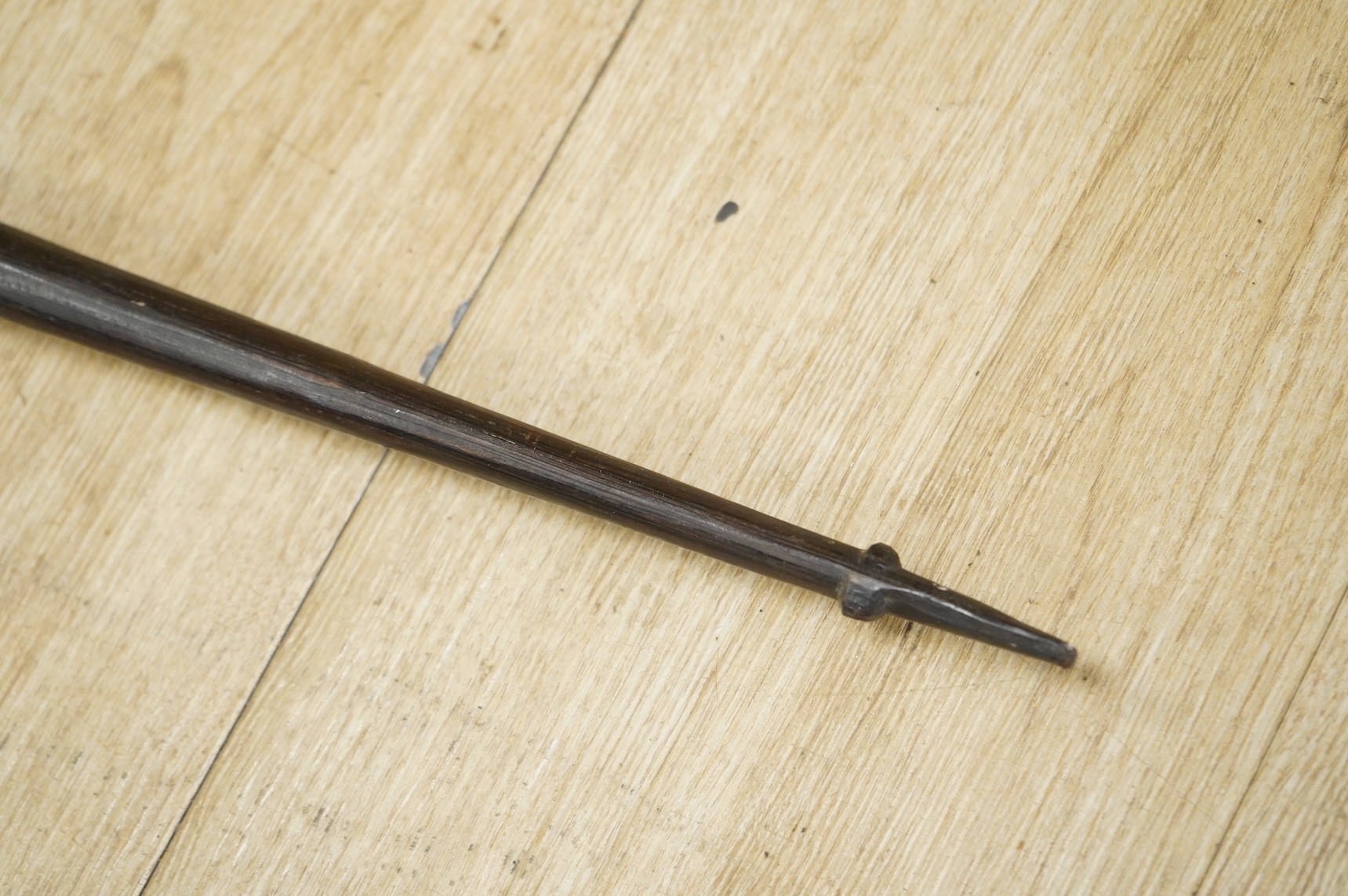Papua New Guinea - a palm wood bow, 169cm long